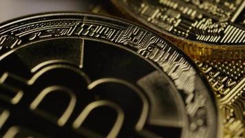 Rotating shot of Bitcoins digital cryptocurrency - BITCOIN 0405 video