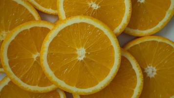 Orange fruit slice in slow motion video