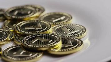 Rotating shot of Litecoin Bitcoins digital cryptocurrency - BITCOIN LITECOIN 0040 video