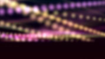 lila och gula prickade linjer som bildar en helix som snurrar med horisontell axel