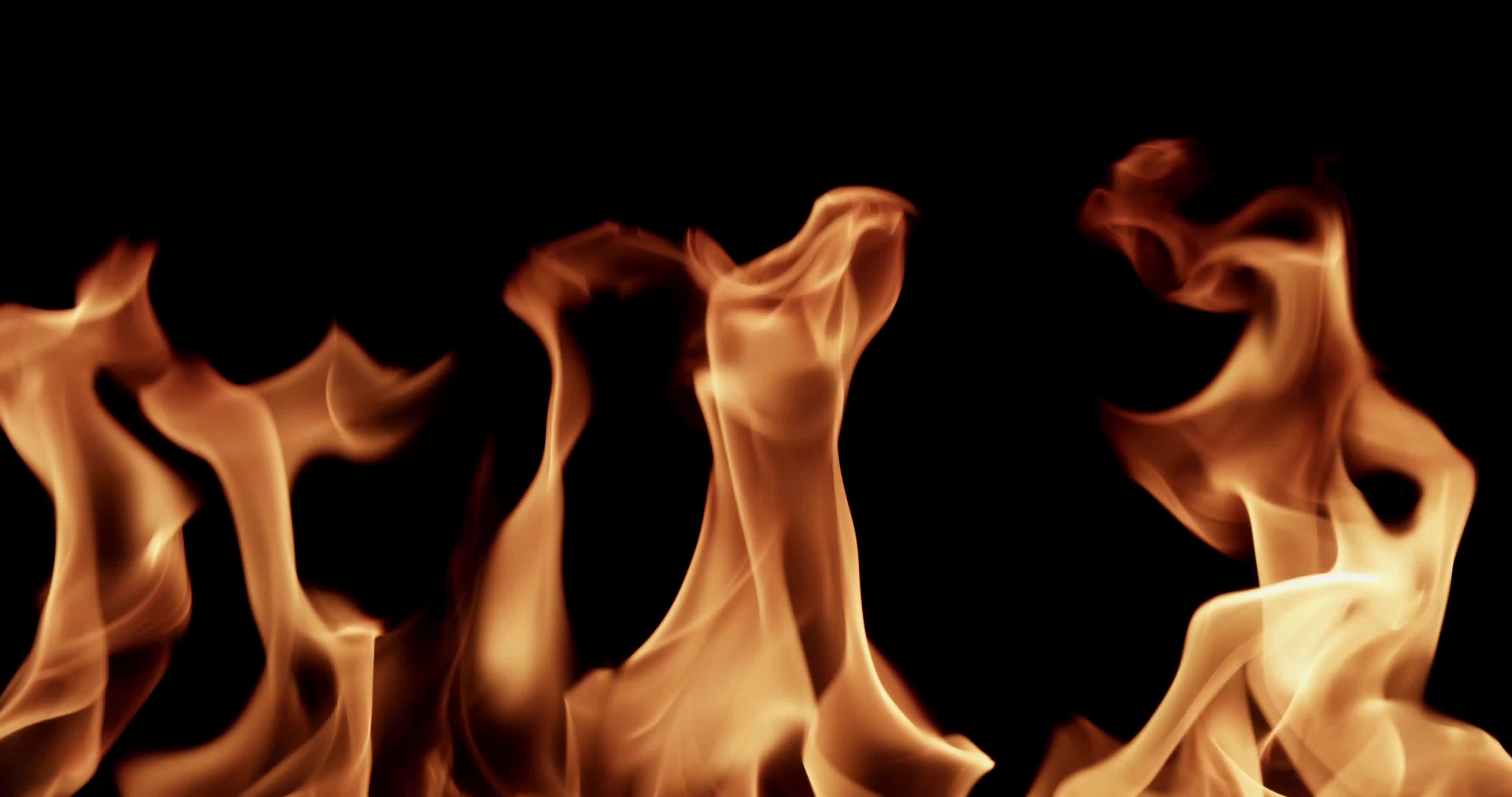 Controlled warm flames creating hot special effects in 4K slow motion