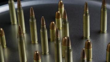 Cinematic rotating shot of bullets on a metallic surface - BULLETS 068 video