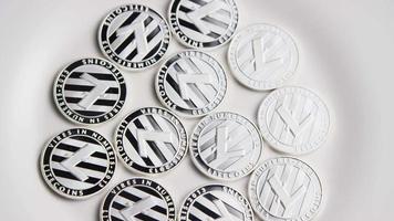 Rotating shot of Litecoin Bitcoins digital cryptocurrency - BITCOIN LITECOIN 0085 video