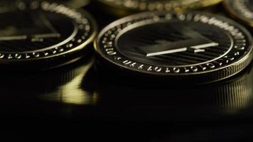 Rotating shot of Bitcoins digital cryptocurrency - BITCOIN LITECOIN 221 video