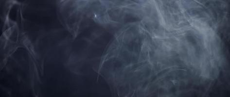 White smoke floating slowly and creating a beautiful dense texture in 4K video