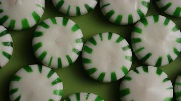 Rotating shot of spearmint hard candies - CANDY SPEARMINT 024 video