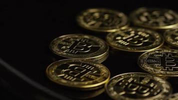 Rotating shot of Bitcoins digital cryptocurrency - BITCOIN 0485 video
