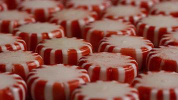 Rotating shot of peppermint candies - CANDY PEPPERMINT 044