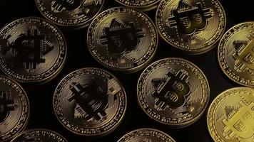 Rotating shot of Bitcoins (digital cryptocurrency) - BITCOIN 0029