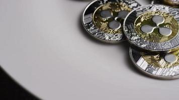 Rotating shot of Ripple Bitcoins (digital cryptocurrency) - BITCOIN RIPPLE 0050