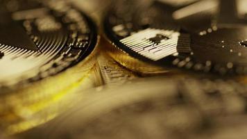 Rotating shot of Bitcoins digital cryptocurrency - BITCOIN MONERO 126 video
