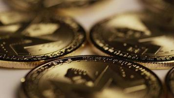 Rotating shot of Bitcoins (digital cryptocurrency) - BITCOIN MONERO 040