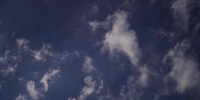 Time lapse of altocumulus and cumulus clouds crossing the scene from left to right in 4K video