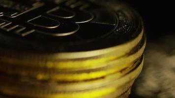 Rotating shot of Bitcoins digital cryptocurrency - BITCOIN 0637 video