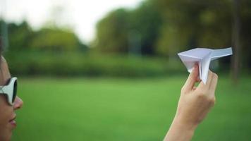 Woman Holding A Paper Airplane video