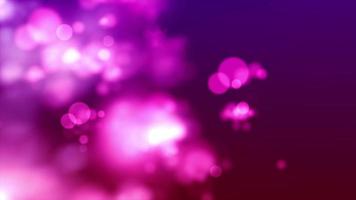 Pink bokeh lights fading and moving on windy purple background video