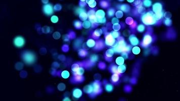 Schleife von hellblauen Bokeh-Lichtern, die auf 4k dunklem Hintergrund schweben