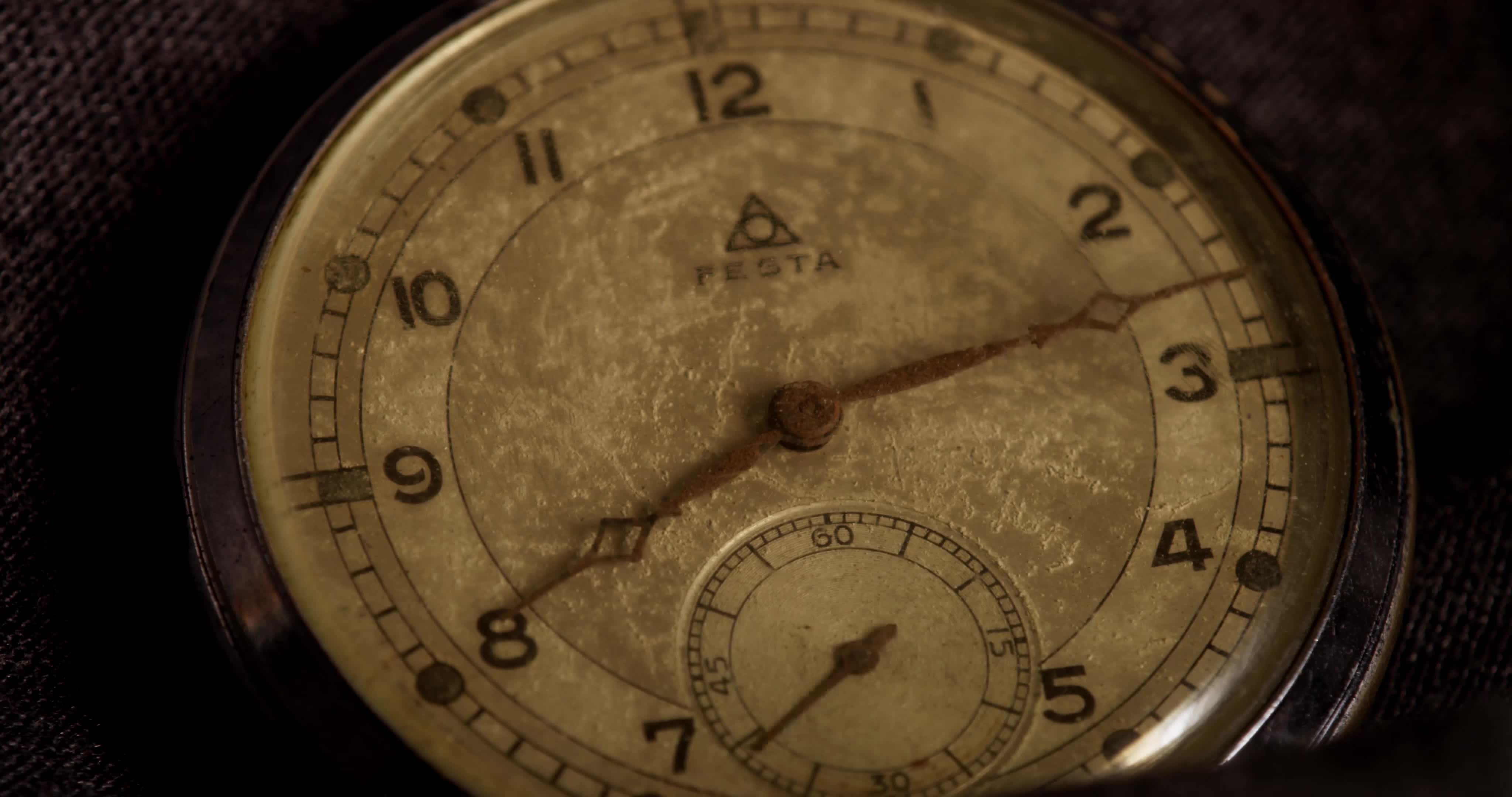 Extreme close up shot of clock hands moving from 807 to 912 in 4K