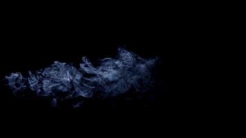 Beautiful plasma effect with swirls created by white smoke in horizontal path on darkbackground in 4K video