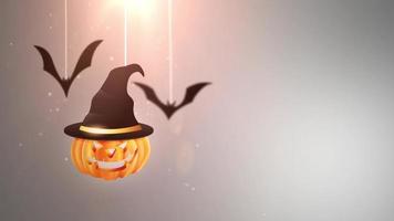 animazione di sfondo grigio di Halloween con zucca e pipistrelli che cadono e appesi a stringhe video