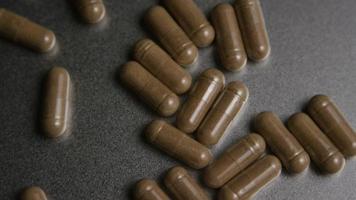 Rotating stock footage shot of vitamins and pills - VITAMINS 0020 video