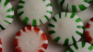 Rotating shot of spearmint hard candies - CANDY SPEARMINT 062 video