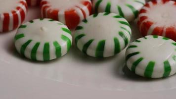 Rotating shot of spearmint hard candies - CANDY SPEARMINT 067 video