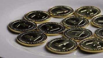 Rotating shot of Litecoin Bitcoins digital cryptocurrency - BITCOIN LITECOIN 0013 video