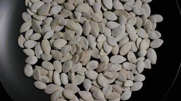 Cinematic, rotating shot of pumpking seeds - PUMPKIN SEEDS 001