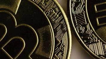 Rotating shot of Bitcoins digital cryptocurrency - BITCOIN 0253 video