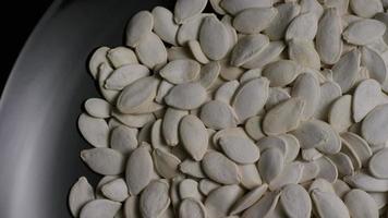 Cinematic, rotating shot of pumpking seeds - PUMPKIN SEEDS 023