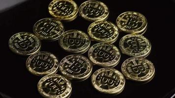 Rotating shot of Bitcoins digital cryptocurrency - BITCOIN 0469 video