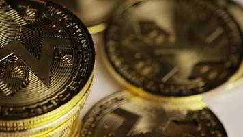 Rotating shot of Bitcoins (digital cryptocurrency) - BITCOIN MONERO 144 video