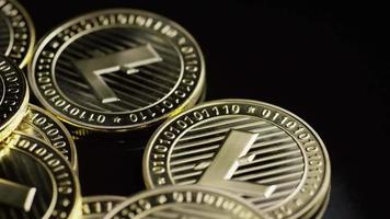 Rotating shot of Bitcoins digital cryptocurrency - BITCOIN LITECOIN 250 video