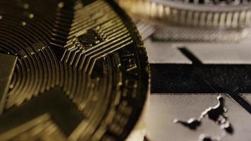 Rotating shot of Bitcoins digital cryptocurrency - BITCOIN MIXED 077 video