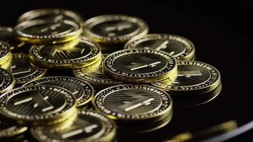 Rotating shot of Bitcoins (digital cryptocurrency) - BITCOIN LITECOIN 258