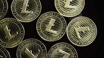 Rotating shot of Bitcoins (digital cryptocurrency) - BITCOIN LITECOIN 191