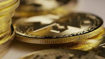 Rotating shot of Bitcoins (digital cryptocurrency) - BITCOIN MONERO 154
