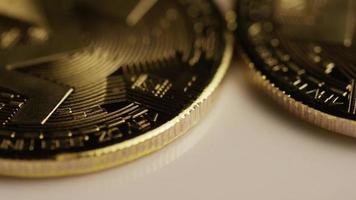 Rotating shot of Bitcoins (digital cryptocurrency) - BITCOIN MONERO 026
