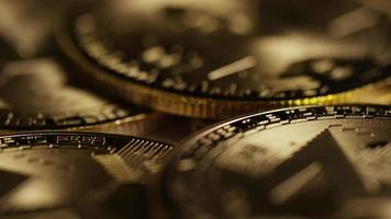 Rotating shot of Bitcoins (digital cryptocurrency) - BITCOIN MONERO 083