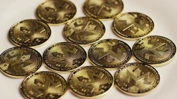 Rotating shot of Bitcoins (digital cryptocurrency) - BITCOIN MONERO 014