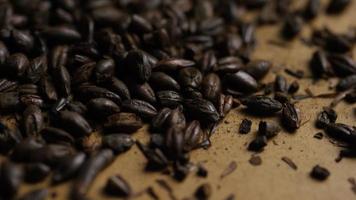 Rotating shot of barley and other beer brewing ingredients - BEER BREWING 154 video