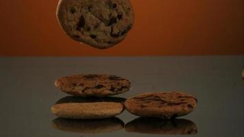 Cookies falling and bouncing in ultra slow motion (1,500 fps) on a reflective surface - COOKIES PHANTOM 130 video