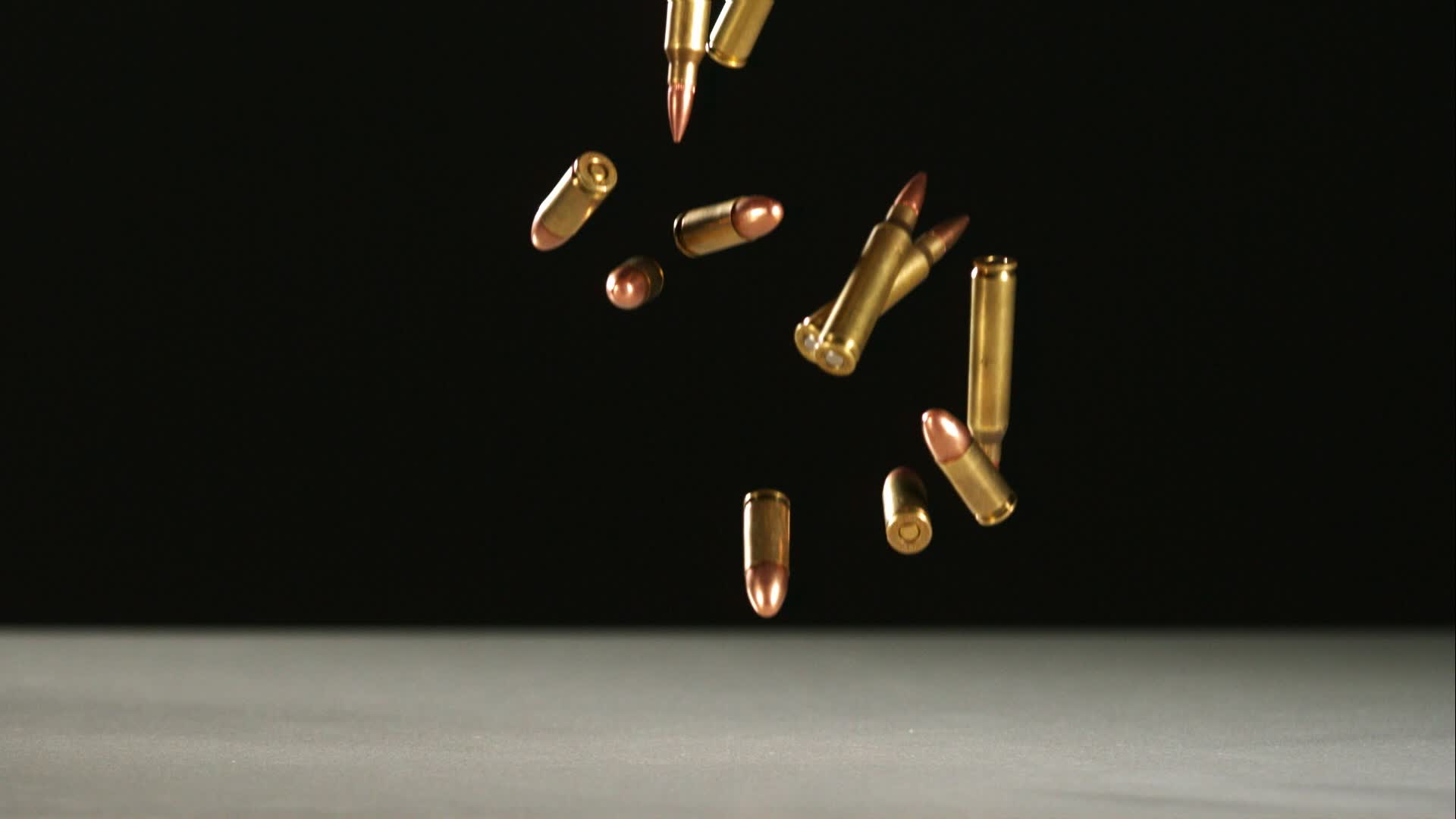 Bullets falling and bouncing in ultra slow motion 1,500 fps on a