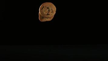 Cookies falling and bouncing in ultra slow motion (1,500 fps) on a reflective surface - COOKIES PHANTOM 003 video