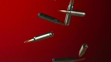 Bullets falling and bouncing in ultra slow motion 1,500 fps on a reflective surface - BULLETS PHANTOM 036 video