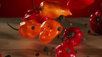 Peppers falling and bouncing in ultra slow motion 1,500 fps on a reflective surface - BOUNCING PEPPERS PHANTOM 008 video