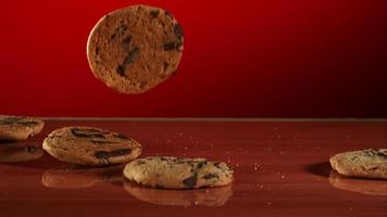 Cookies falling and bouncing in ultra slow motion (1,500 fps) on a reflective surface - COOKIES PHANTOM 024 video