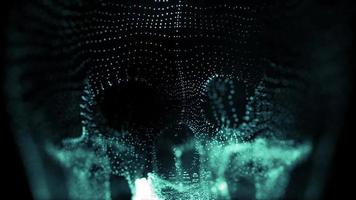 una calavera azul brillante espeluznante hecha de partículas video