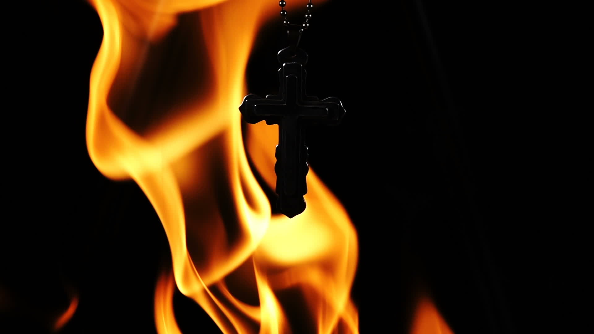 A Cross in Fire as Background 1797462 Stock Video at Vecteezy